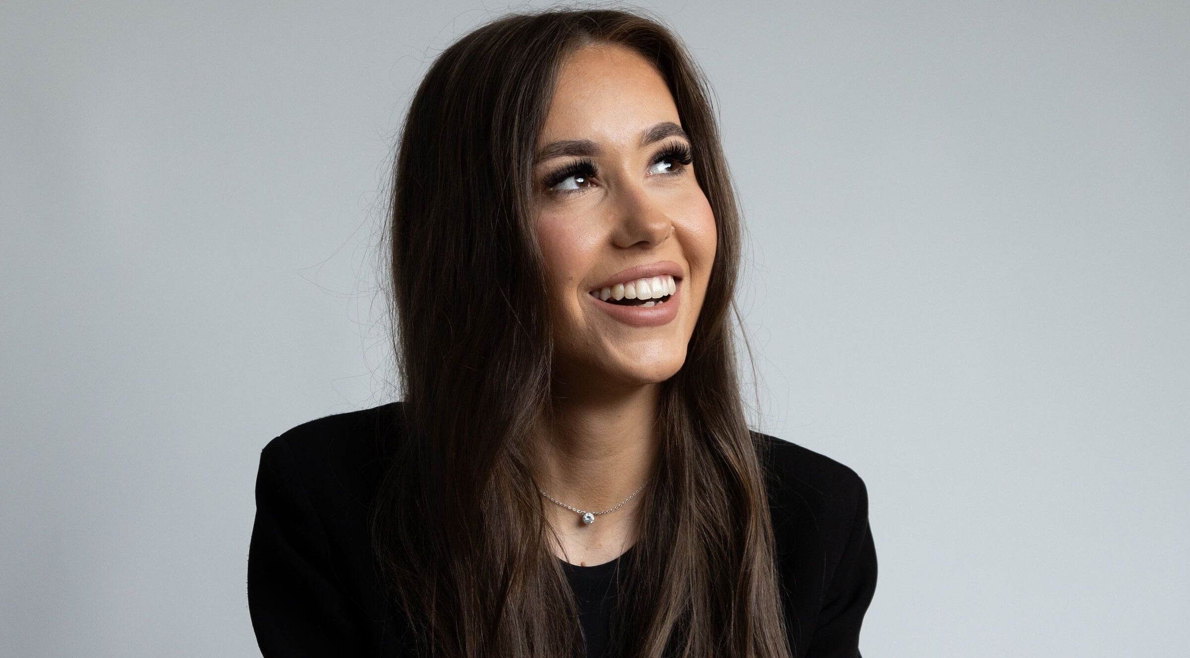 Smiling woman at Blondes & Brondes By Beth, East Kilbride, Scotland, GB. Radiant hair and happiness.
