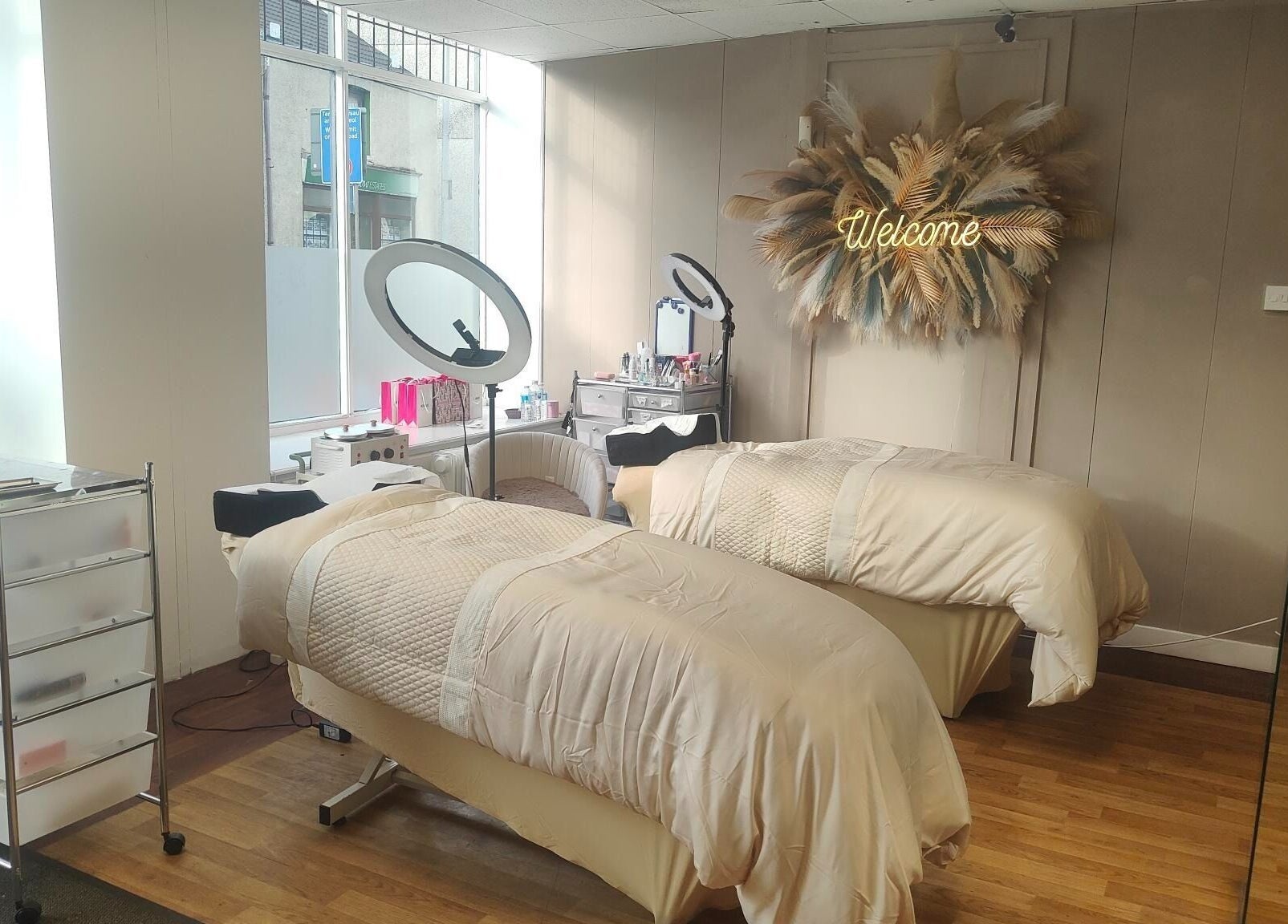 Cozy treatment room at Oh La Lash and Beauty, Llanelli, Wales, GB. Features plush beds and welcoming decor.