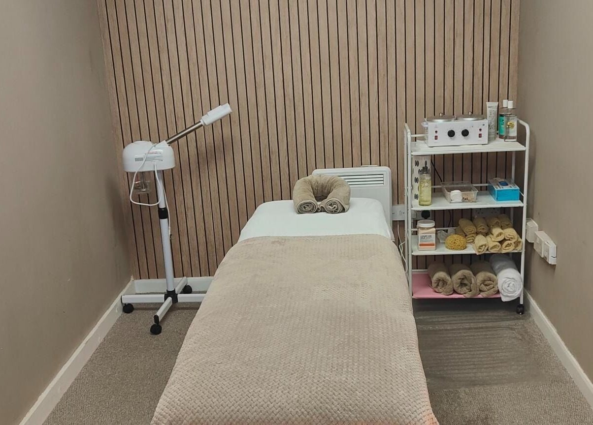 Relaxing treatment room at Oh La Lash and Beauty, Llanelli, Wales, GB, featuring a plush bed and spa essentials.