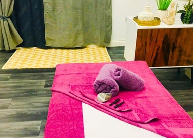 Relaxing massage setup at Sawan Thai Massage Halifax in Halifax, England, GB with pink towels and decor.
