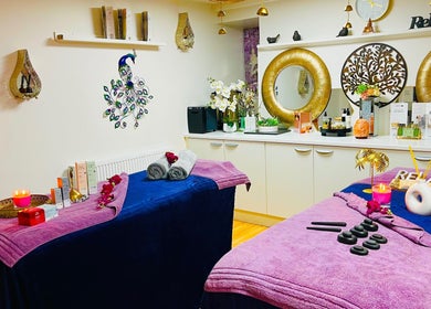 Relaxing massage rooms at Sawan Thai Massage Halifax, England, GB, adorned with candles and decor.