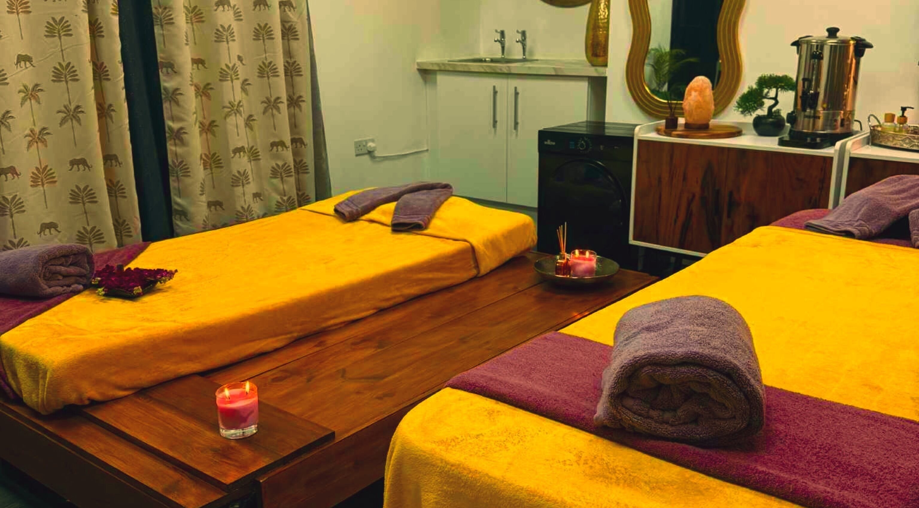Relaxing massage room at Sawan Thai Massage Halifax, Halifax, England, GB, with cozy yellow and purple decor.