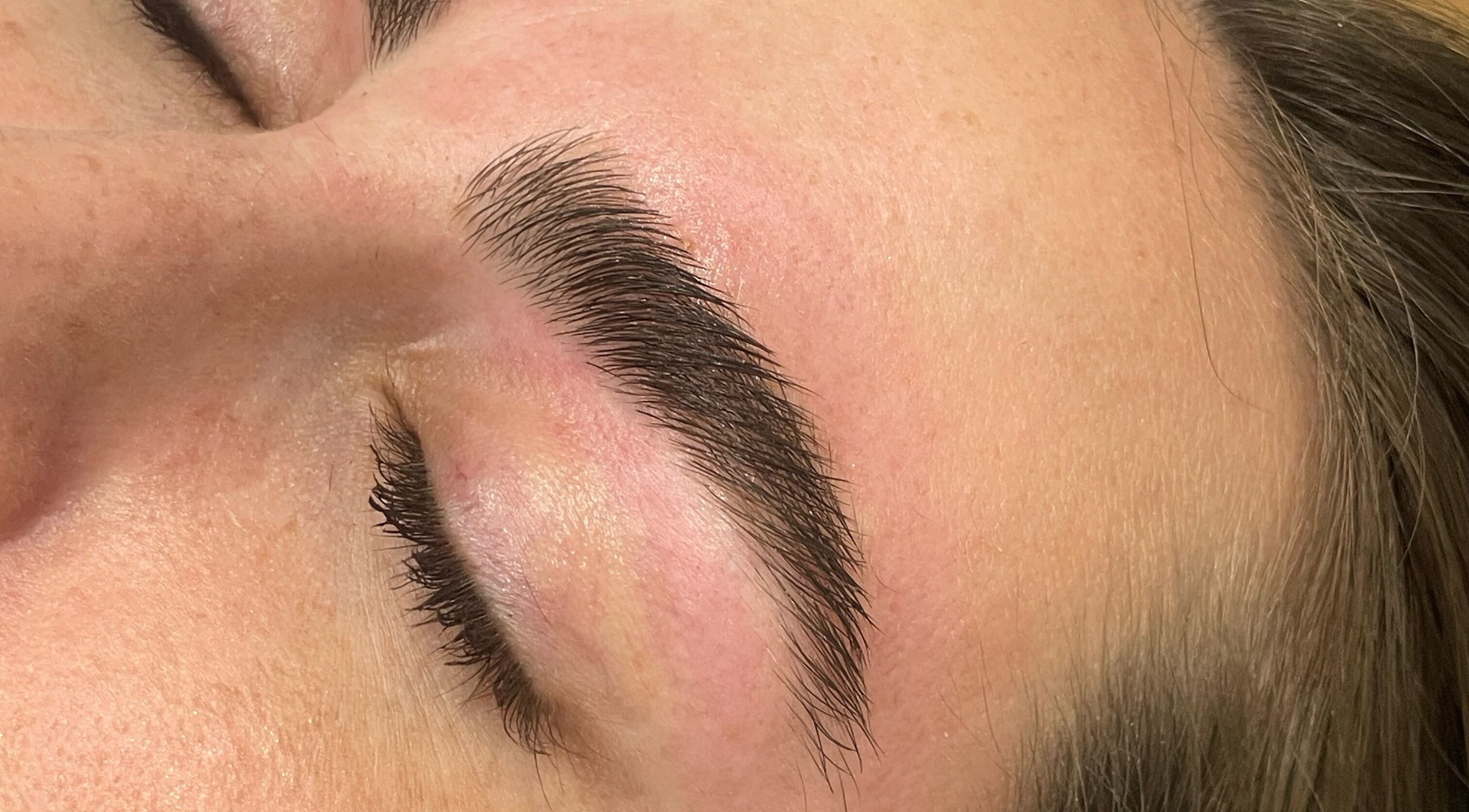 Close-up of expertly shaped eyebrows at Mollie Langston Brows, Fulham, South Australia, AU.