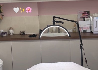 Tranquil treatment room at By Tia Maria - Beauty, Fleet, England, GB with elegant decor and professional setup.