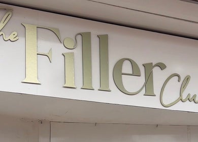 By Tia Maria Beauty @ The Filler Club storefront sign in Farnborough, England, GB.