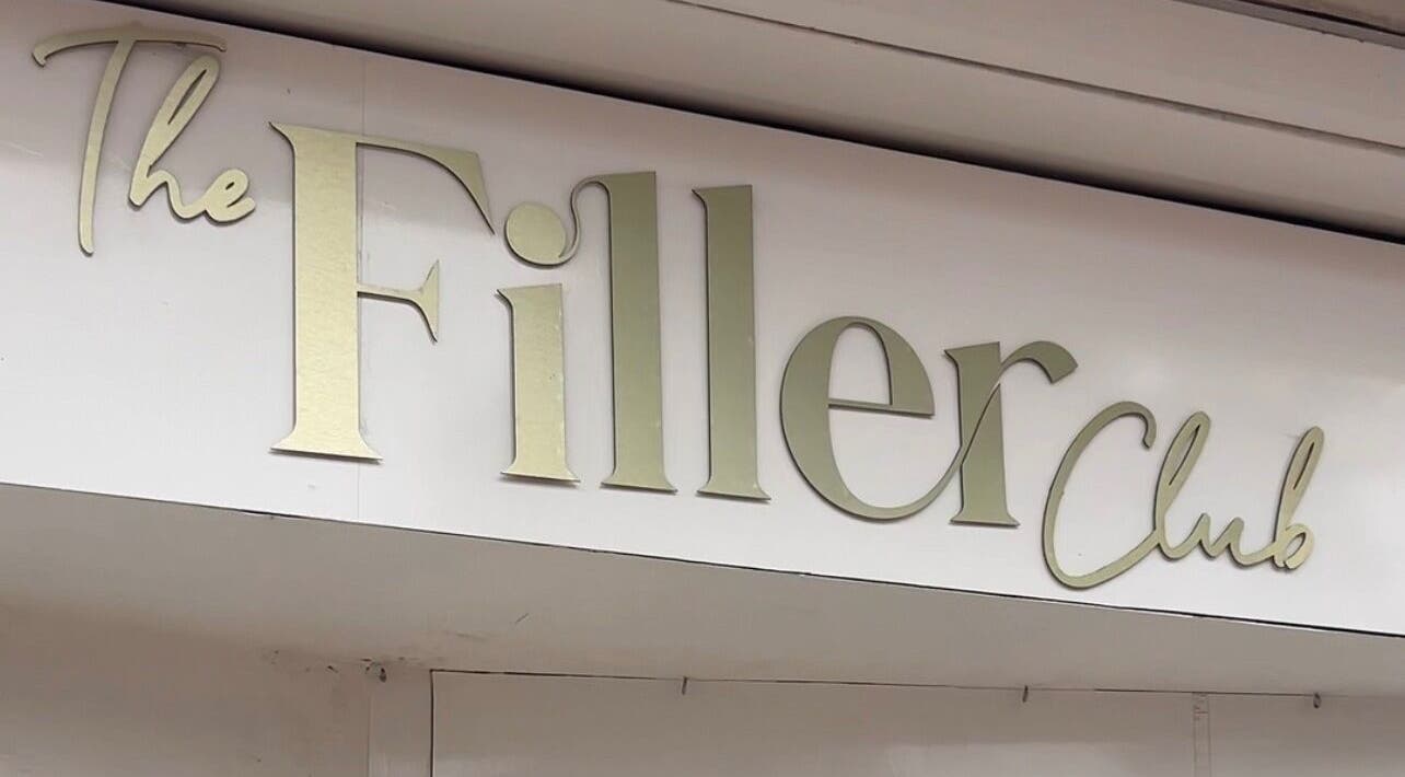 By Tia Maria Beauty @ The Filler Club storefront sign in Farnborough, England, GB.