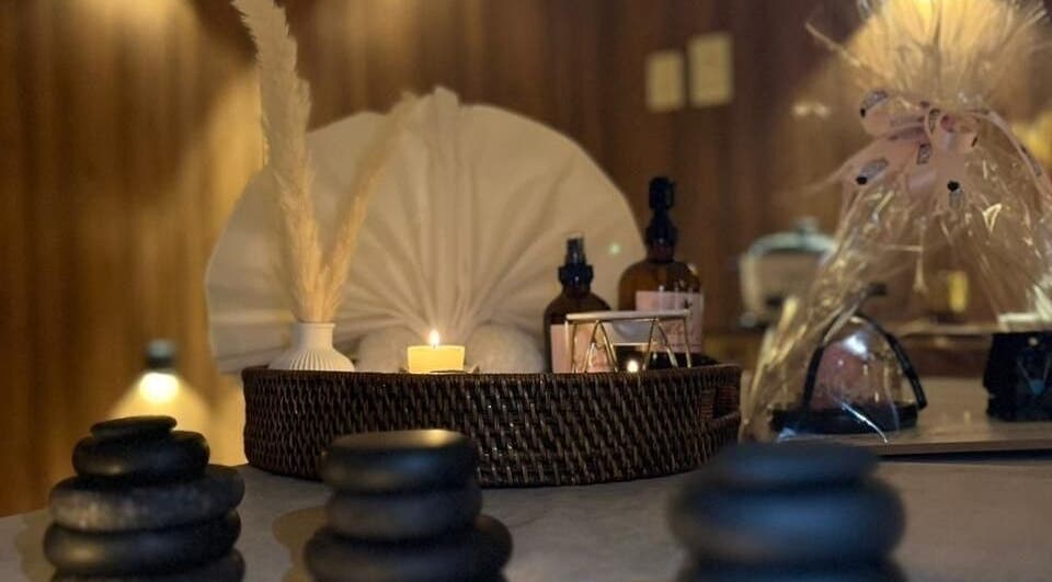 Calming spa ambiance at Kholoud Beauty I مركز خلود بيوتي, Dammam, Eastern Province, SA with stones and candles.