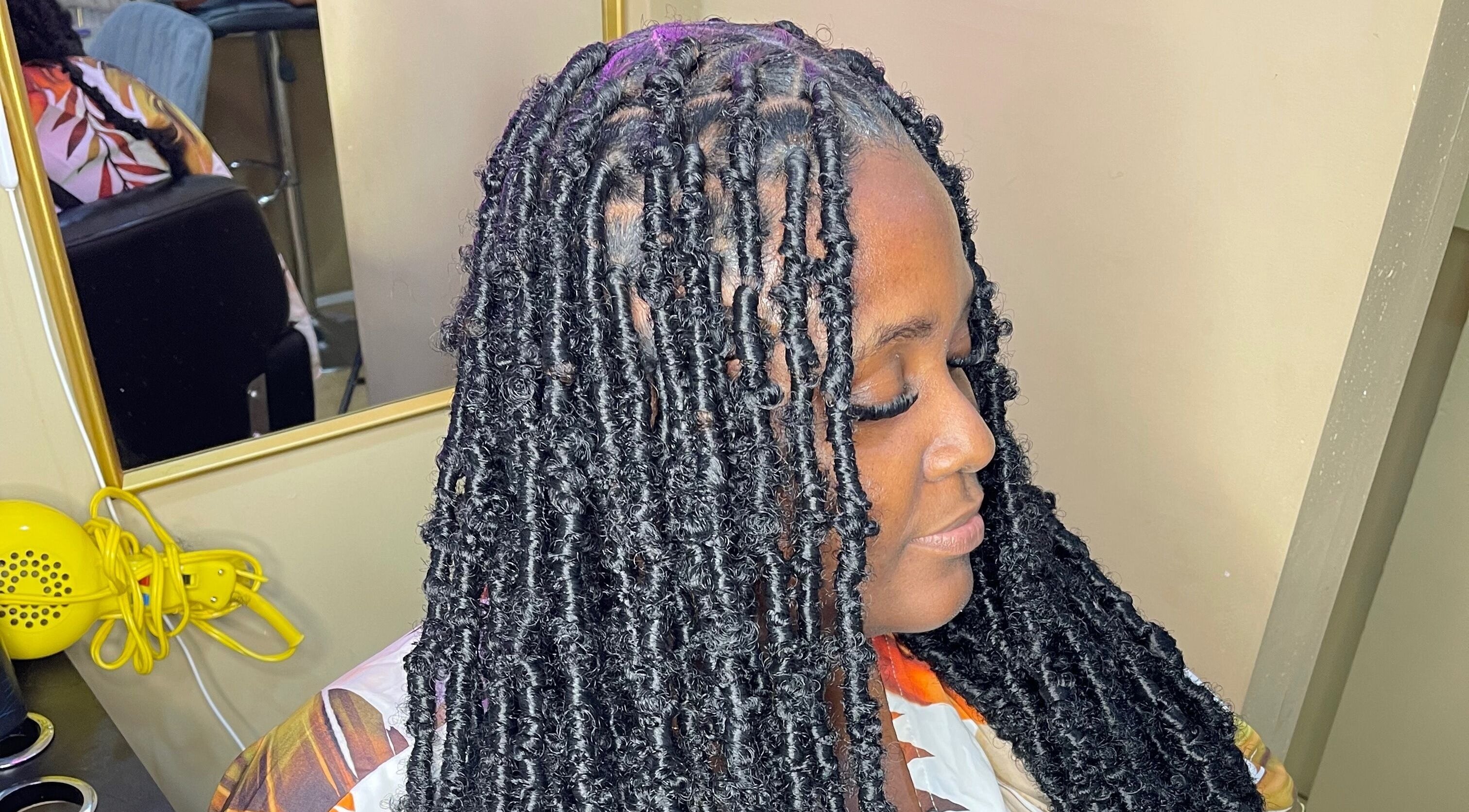 Stylish locs hairstyle at Locsbytamii, Kingston, St. Andrew Parish, JM in a modern salon setting.