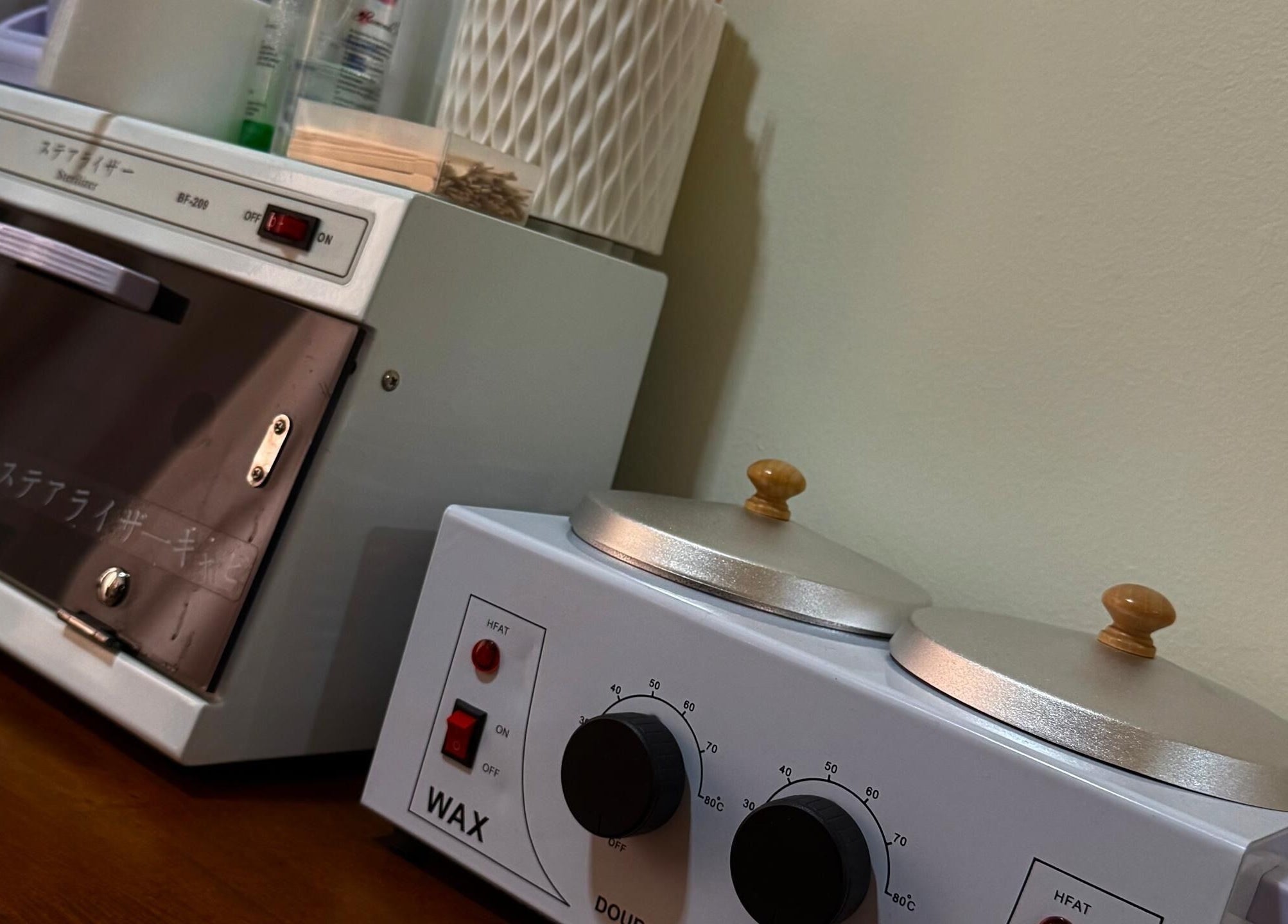 Sanitizer and wax heater at Grace By Riyaa, Shah Alam, Selangor, MY ensuring hygiene and quality service.