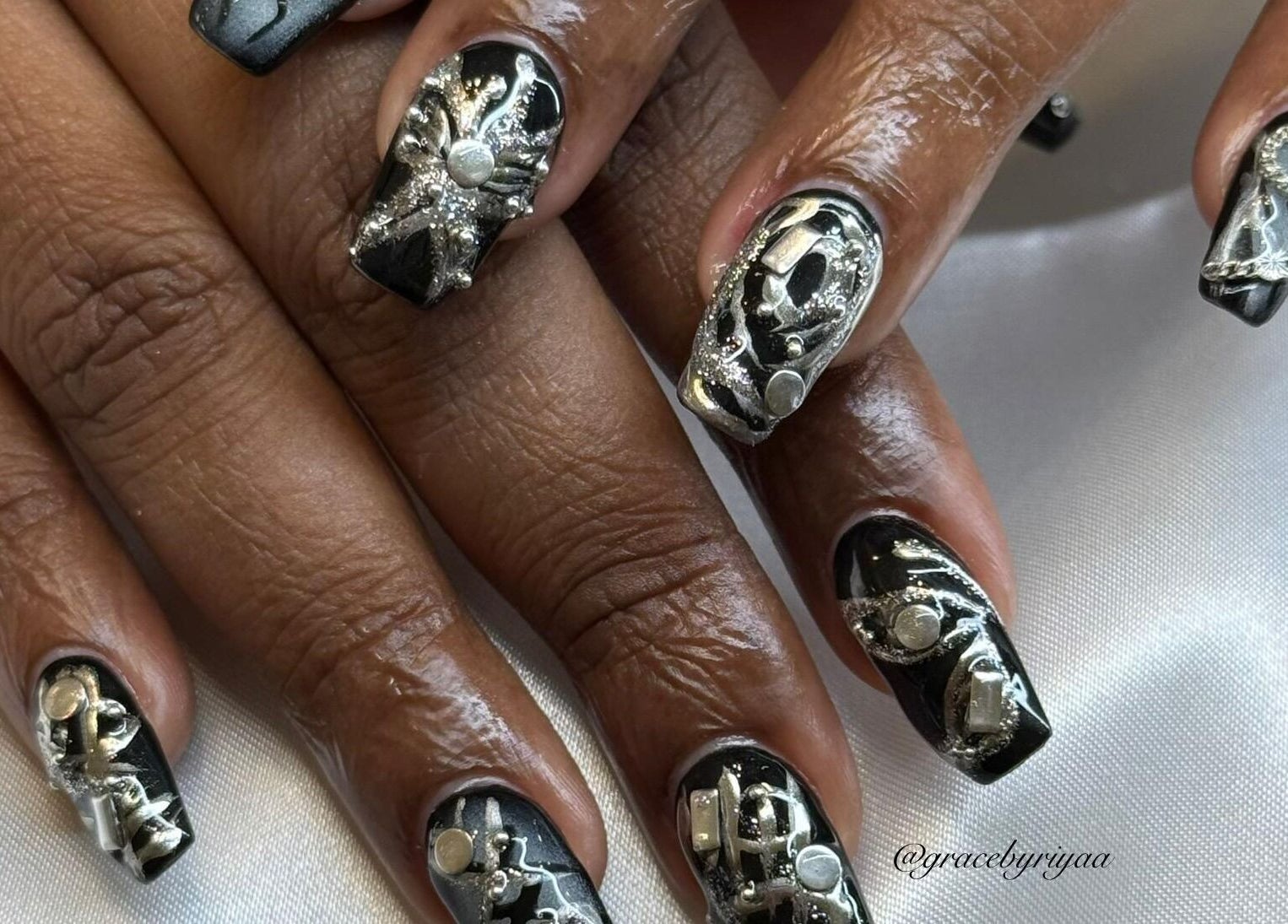 Intricate black and silver nail design at Grace By Riyaa, Shah Alam, Selangor, MY.