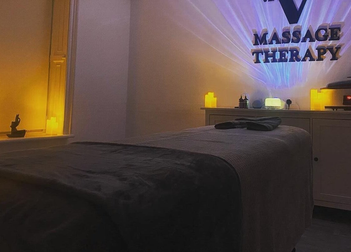Tranquil massage therapy room at VALER Massage Therapist and Male Waxing, Ruislip, England, GB with soft lighting.