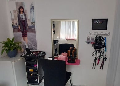 Beauty by Merle (Pty) Ltd salon styling station in Randburg, Gauteng, ZA featuring elegant decor and equipment.