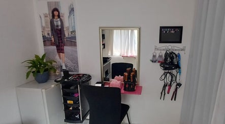 Beauty by Merle (Pty) Ltd salon styling station in Randburg, Gauteng, ZA featuring elegant decor and equipment.