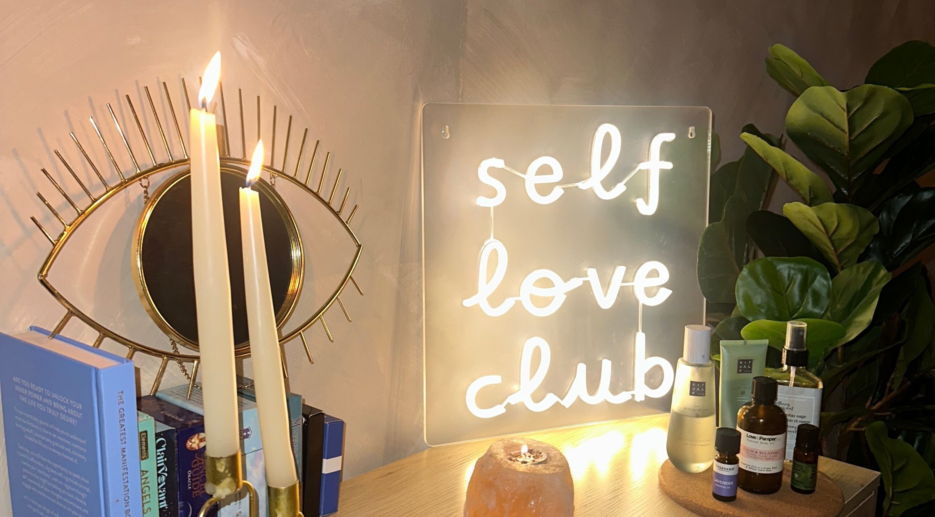Serenity Seven ambiance with candles and self love sign in Hamilton, Scotland, GB