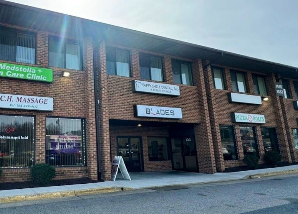 Exterior of CH Massage located in a red brick building in Woodbridge, Virginia, US.
