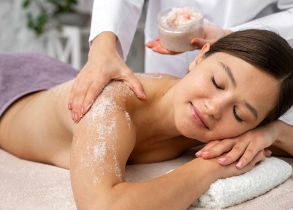 Client enjoying an exfoliating massage at CH Massage in Woodbridge, Virginia, US for ultimate relaxation.