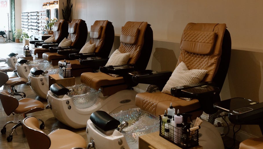 Relaxing pedicure chairs at The Nail Bar in Shrewsbury, Massachusetts, US, offering a serene spa experience.