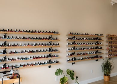 Vibrant nail polish display at The Nail Bar, Shrewsbury, Massachusetts, US.