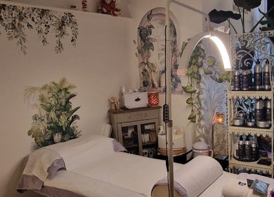 Cozy treatment room at Tranquility in Hastings, England, GB, featuring soothing decor and ambient lighting.