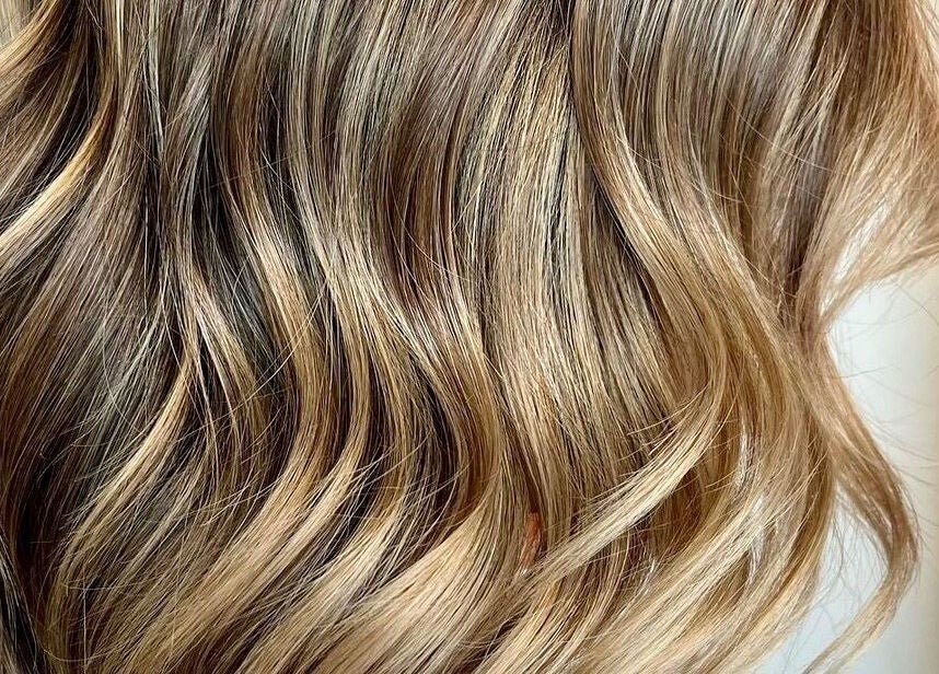 Close-up of wavy blonde hair at BAE Salon, Woolooware, New South Wales, AU.