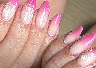 Elegant pink ombre nails with floral art at Nails by Oliwia, Ellesmere Port, England, GB.
