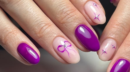 Intricate violet nail art at Nails by Oliwia, Ellesmere Port, England, GB featuring glossy and gemstone accents.