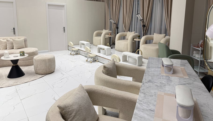Modern seating area at Palm Aura Beauty Salon, Dubai, Dubai, AE offering luxurious comfort and style.
