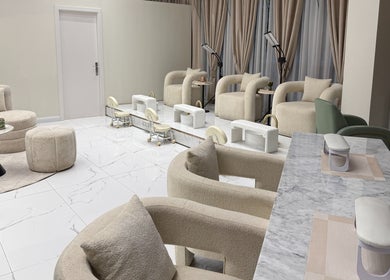Modern seating area at Palm Aura Beauty Salon, Dubai, Dubai, AE offering luxurious comfort and style.
