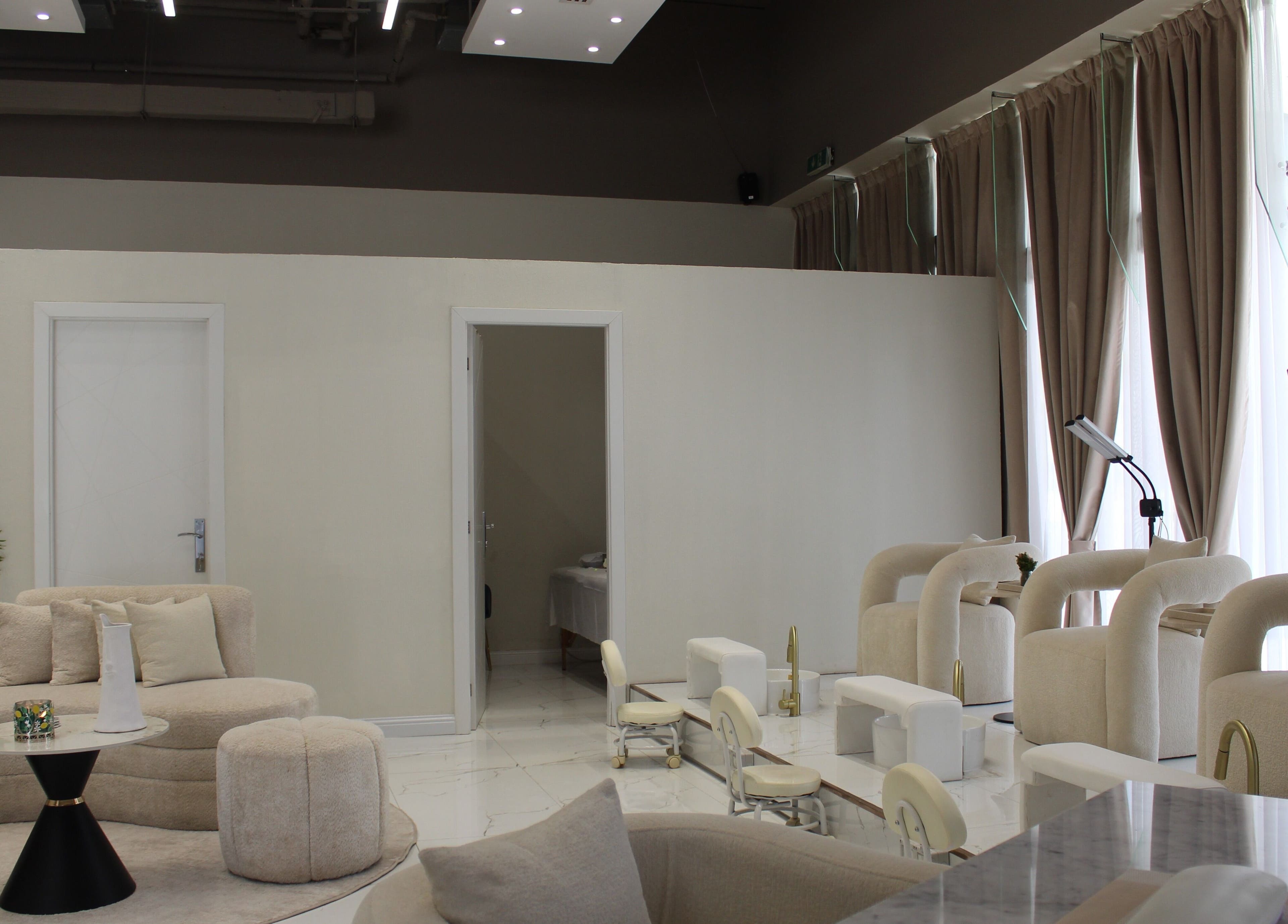 Luxurious interior of Palm Aura Beauty Salon in Dubai, Dubai, AE, highlighting elegant salon seats and decor.