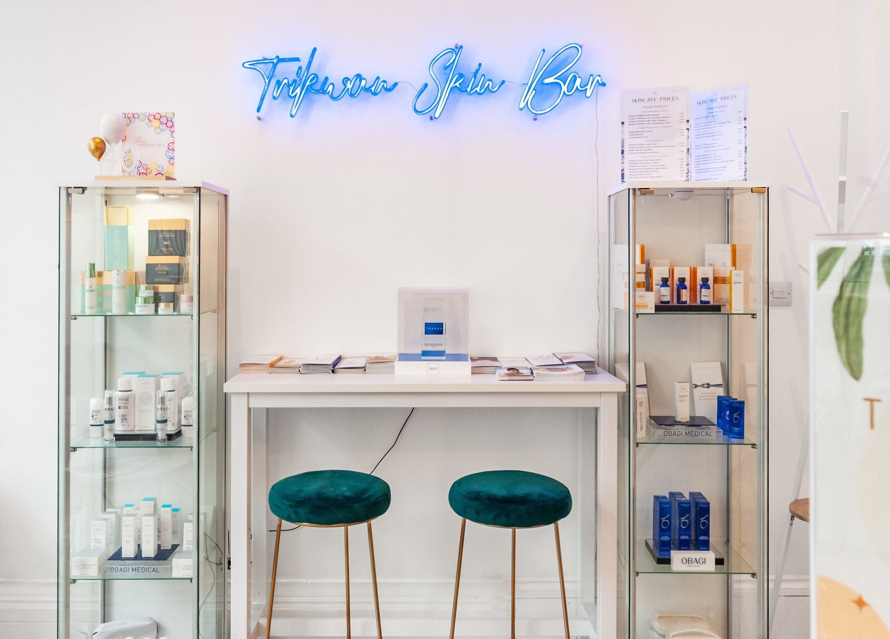 Elegant interior of Trikwan Aesthetics in London, England, GB showcasing skincare products and services.