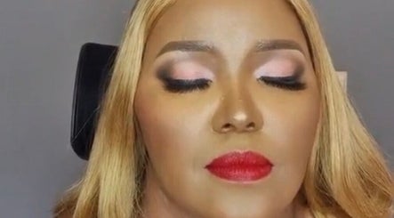 Elegant makeup at La Beaute by Carine, Randburg, Gauteng, ZA. Perfectly applied bold red lipstick and eye makeup.