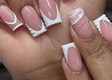 Intricate white nail designs at La Beaute by Carine in Randburg, Gauteng, ZA. Perfect for a stylish look.