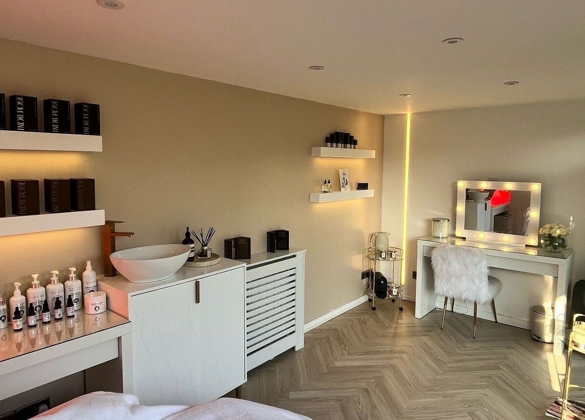 Elegant treatment room at The Beauty Atelier Stalbans, St Albans, England, GB, showcasing ambient lighting and decor.