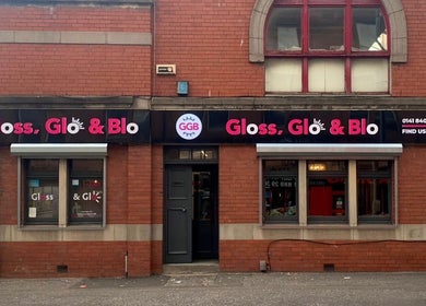 Front view of Gloss Glo & Blo in Paisley, Scotland, GB showcasing the salon's vibrant exterior.