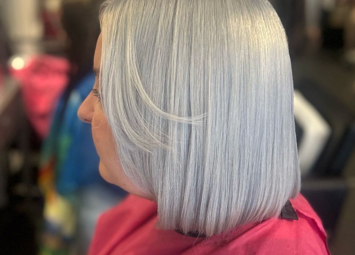 Stylish silver haircut at Gloss Glo & Blo in Paisley, Scotland, GB. Experience premium hair care services.
