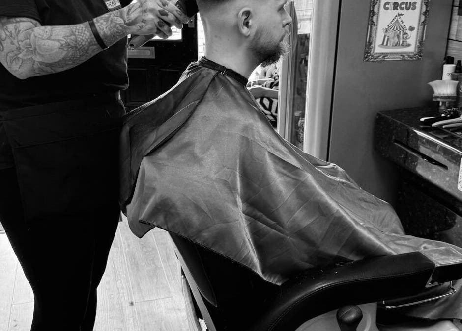 Haircut in progress at Paul's Hairdressing for Men, Wallsend, England, GB.