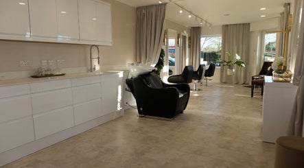 Modern salon interior at Hair.byizzyangellx, Totton, England, GB, featuring sleek design and relaxing environment.