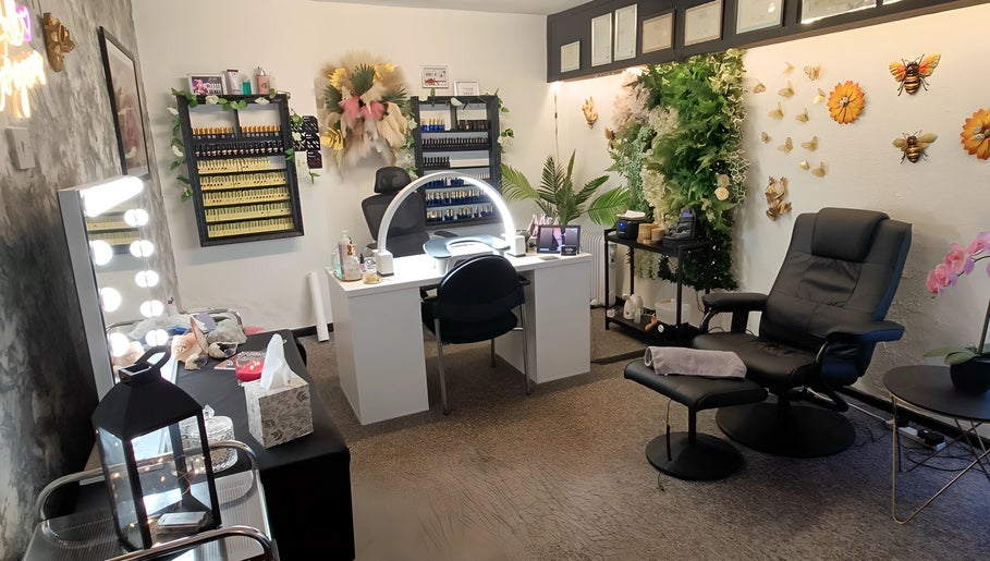 Relax in a lush setting at Balanced Boutique, Newtownards, Northern Ireland, GB, with elegant decor and comfy chairs.