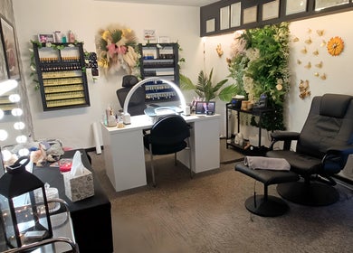 Relax in a lush setting at Balanced Boutique, Newtownards, Northern Ireland, GB, with elegant decor and comfy chairs.