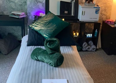 Relaxing massage room at Balanced Boutique, Newtownards, Northern Ireland, GB with cozy décor and soft lighting.