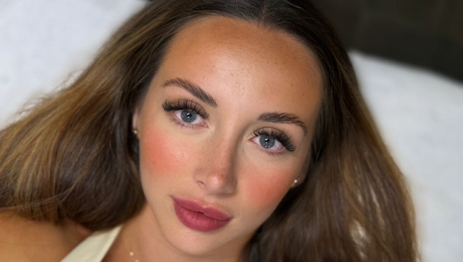 Close-up of a woman's face with flawless makeup at Kiah Lopez Beauty, Gibraltar, GI.