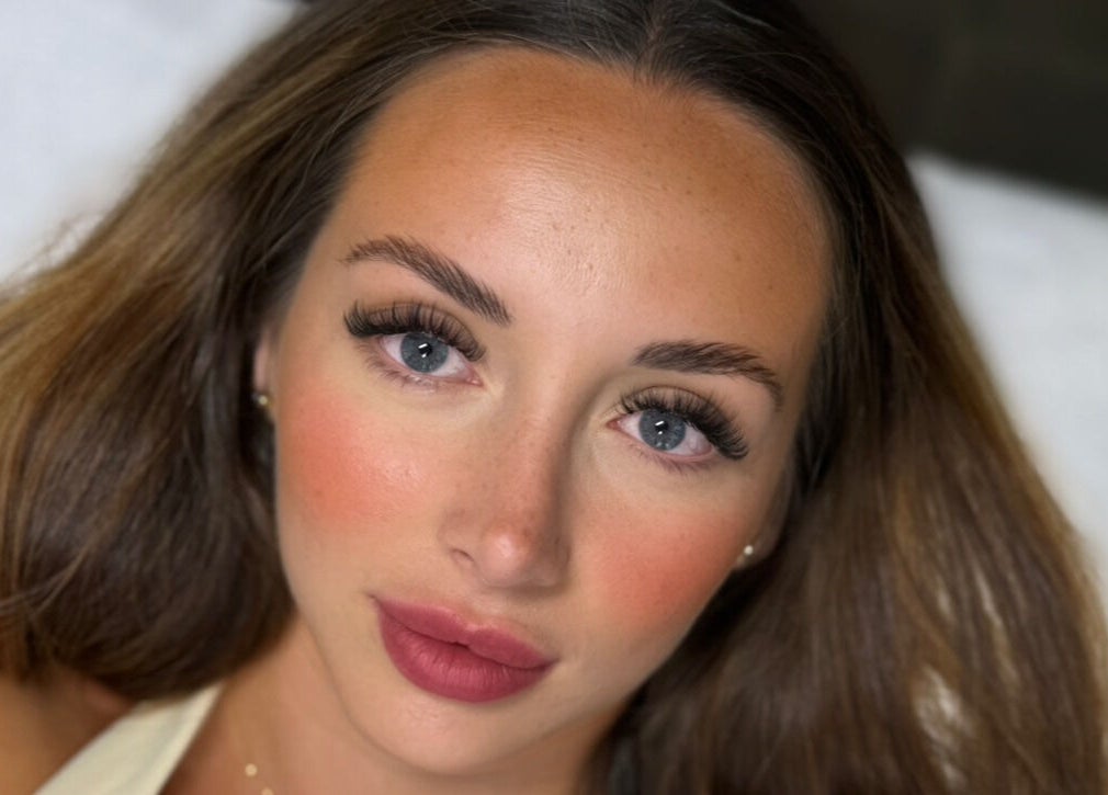 Close-up of a woman's flawless makeup at Kiah Lopez Beauty, Gibraltar, GI, showcasing elegance and style.