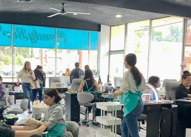 Inside BeautyBar SGV in San Gabriel, California, US, showcasing customers enjoying manicures and pedicures.