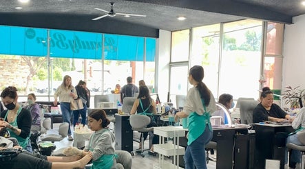 Inside BeautyBar SGV in San Gabriel, California, US, showcasing customers enjoying manicures and pedicures.