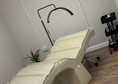 Treatment room at Miceli Beauty Studio in Waterlooville, England, GB, featuring a massage bed and beauty tools.