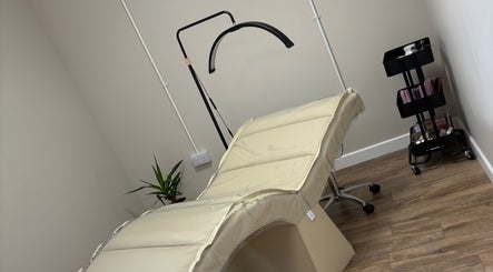 Treatment room at Miceli Beauty Studio in Waterlooville, England, GB, featuring a massage bed and beauty tools.