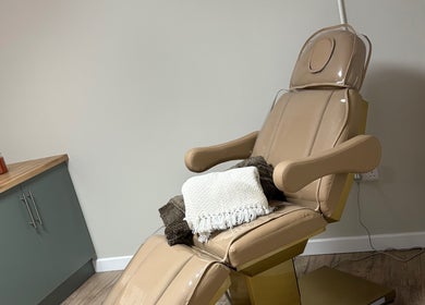 Comfortable treatment chair at Miceli Beauty Studio, Waterlooville, England, GB, with plush blankets and modern decor.