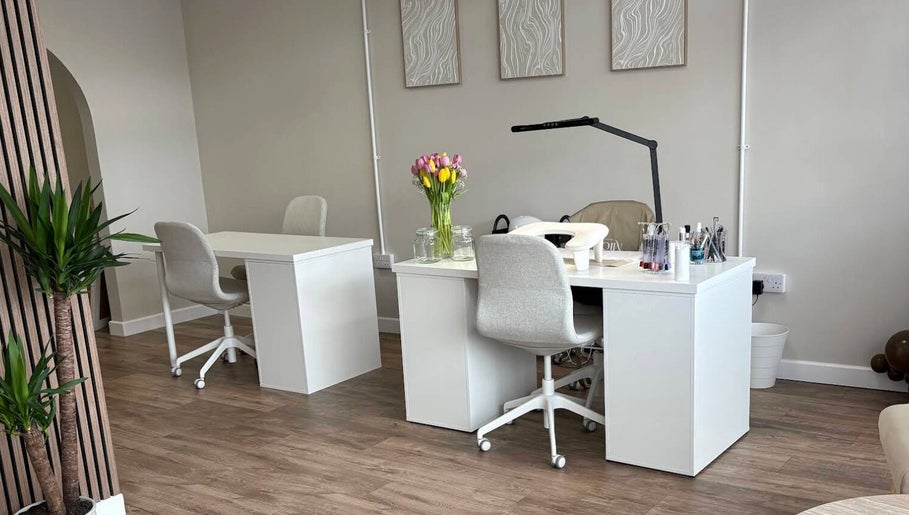 Tranquil nail salon at Miceli Beauty Studio, Waterlooville, England, GB with modern decor and vibrant flowers.