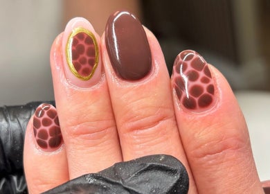 Brown and gold nail design at Miceli Beauty Studio, Waterlooville, England, GB.