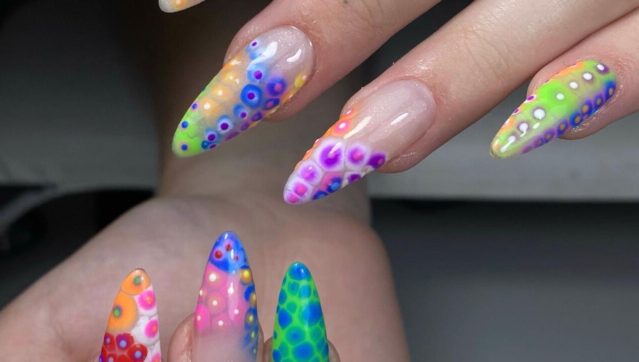 Colorful nail designs showcasing vibrant patterns at Elegancenail Studio, Arndell Park, New South Wales, AU.